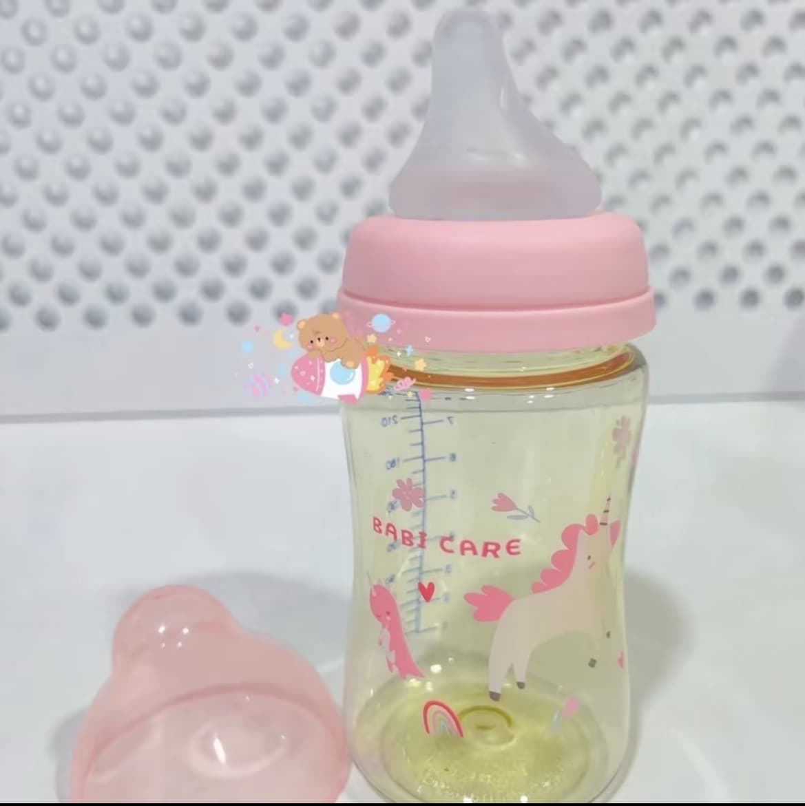 ขวดนมสีชาคอกว้าง จุกเอียงไม่ดูดไม่ไหล8ออนซ์สีชมพู(รับ10,200 แต้ม)