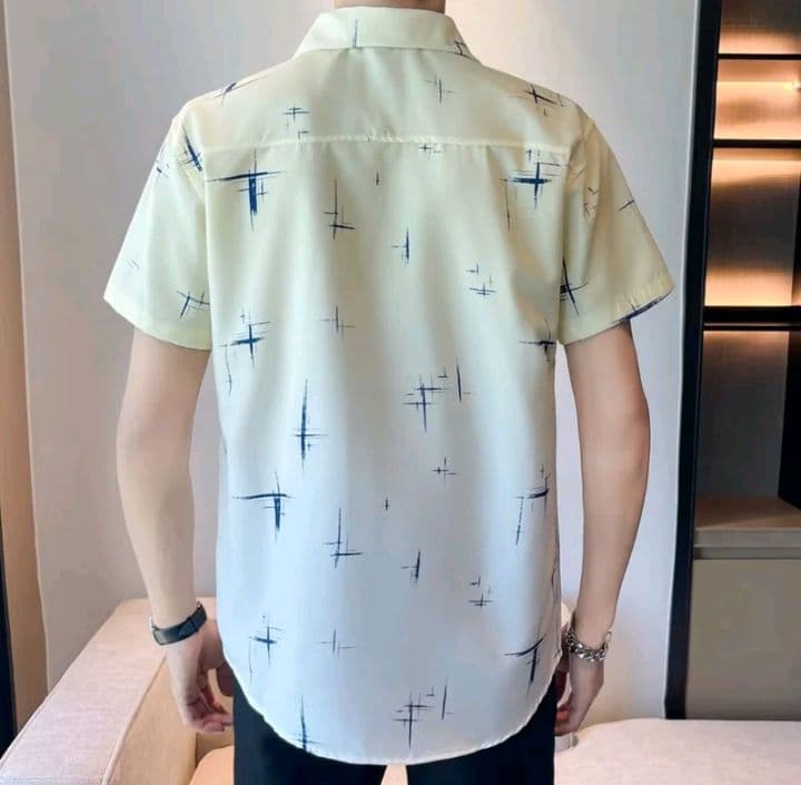 ฤดูร้อนใหม่ สีเหลืองปุ่มโลหะ เสื้อเชิ้ตแขนสั้นผู้ชายธุรกิจสบายๆ เสื้อเชิ้ตเด็กผู้ชาย ครึ่งแขนเสื้อคอยาว เสื้อแฟชั่นผู้ชาย เสื้อคอจีนผู้ชาย พีอินทรีเสื้อวินเทจ (รับ12,200แต้ม)